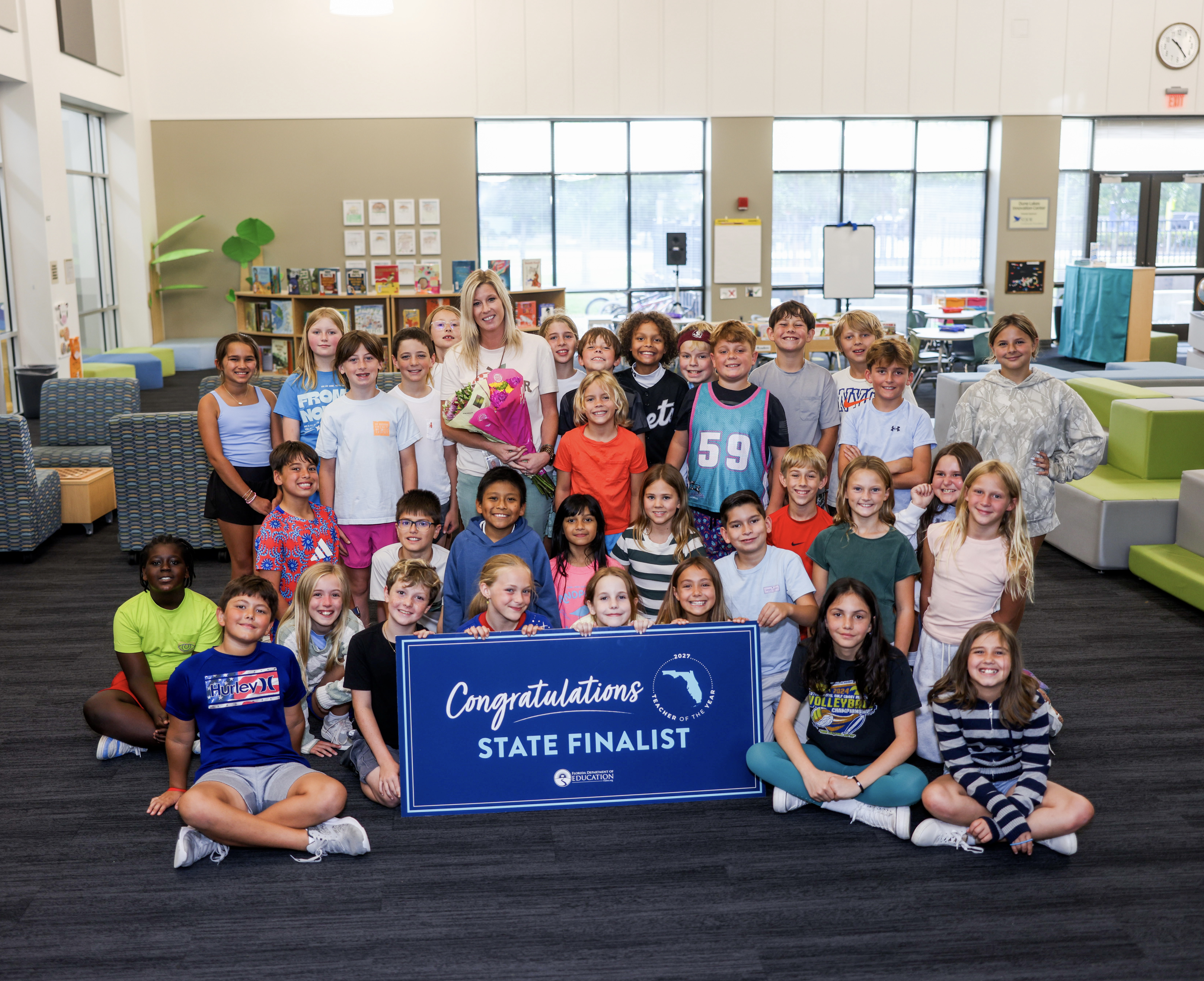 Bree O’Donnell, a fourth-grade math and science teacher at Dune Lakes Elementary School in Walton County, with her students. 