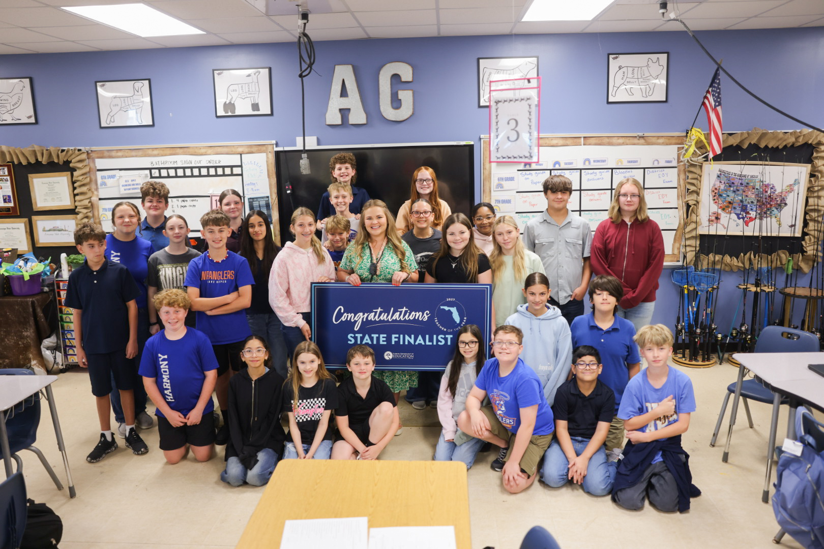 Kyndall Brown, a middle school agriculture teacher, with her students at Harmony Middle School in Osceola County
