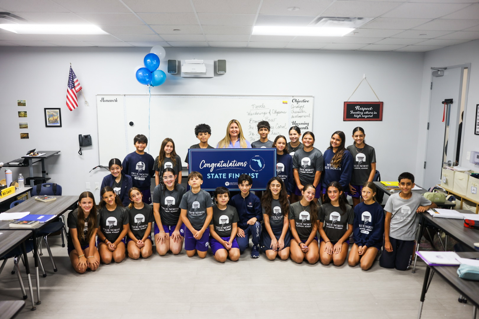 Nicole Leon, a sixth-grade literature teacher at True North Classical Academy, with her students.