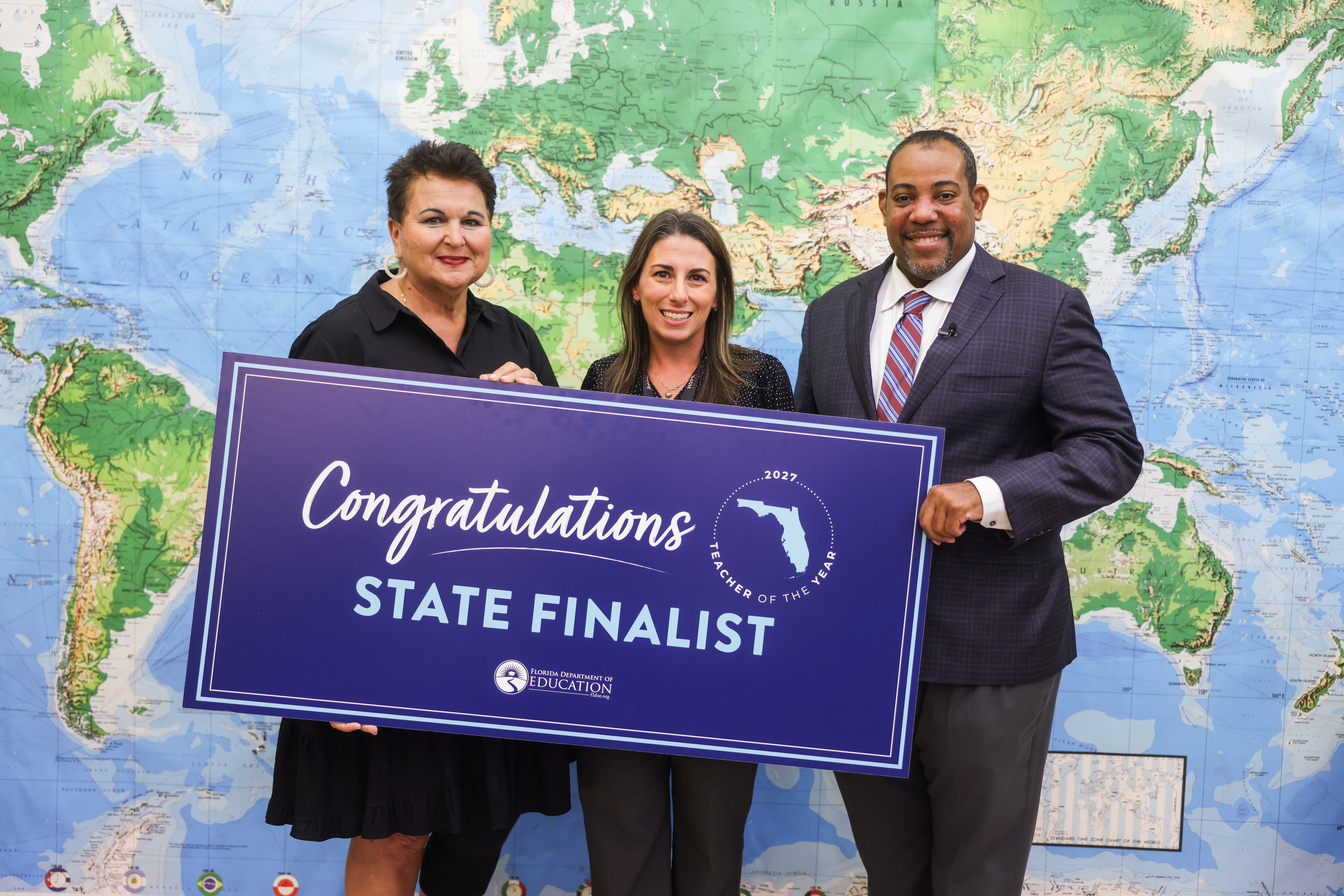 Kathy Burns, Superintendent, Sarah Twardy, Senior Chancellor Paul Burns